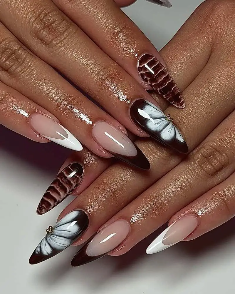 Brown and white butterfly nails with French tips and wood textures